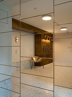 Designové obklady a doplňky z patinované mosazi  - (Prague Marina Nova, Lobby 2)