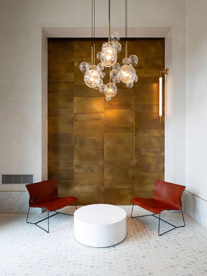 Designové obklady a doplňky z patinované mosazi  - (Prague Marina Nova, Lobby 4)